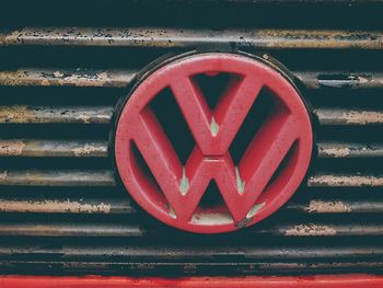 Close-up of stop sign on wall