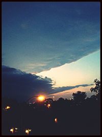 Scenic view of landscape against sky at sunset