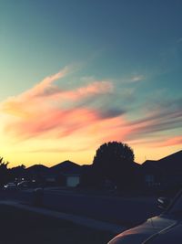 Silhouette of road against scenic sky