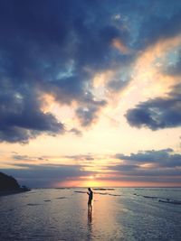 Scenic view of sea at sunset