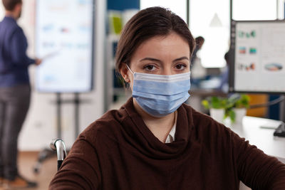 Portrait of woman wearing mask