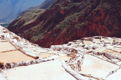 High angle view of saltmines in the mountains against sky