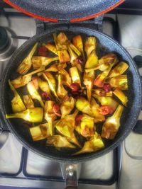 Close-up of meat in cooking pan