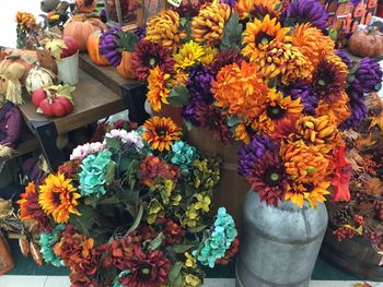 Colorful flowers for sale at market stall