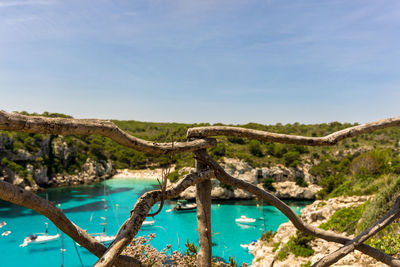 Scenic view of swimming pool by sea against sky