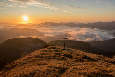 Scenic view of mountains against sky during sunset