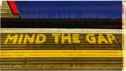 Text on railroad station platform