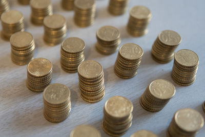 High angle view of coins on table
