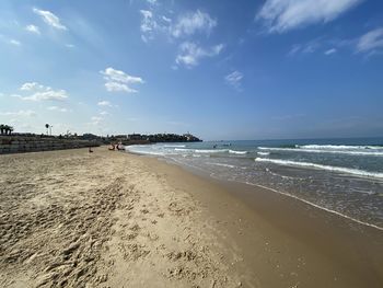 Scenic view of beach against sky