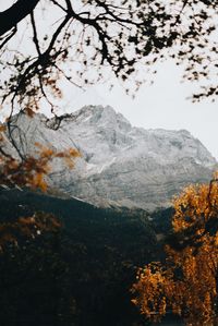 Scenic view of snowcapped mountains during autumn