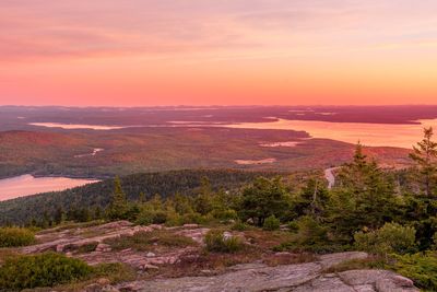 Scenic view of landscape against sky during sunset