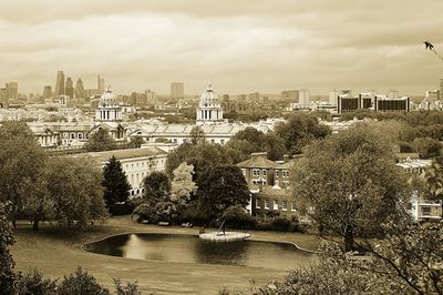 High angle view of river by buildings in city