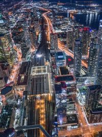 High angle view of city buildings at night