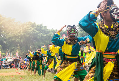 Colossal topeng dance performed by thousands of dancers in the wonosobo ,indonesia