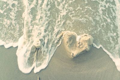 High angle view of sand on beach