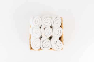 Directly above shot of cake against white background
