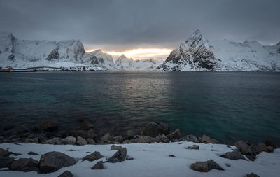 Scenic view of snowcapped mountains against sky during winter
