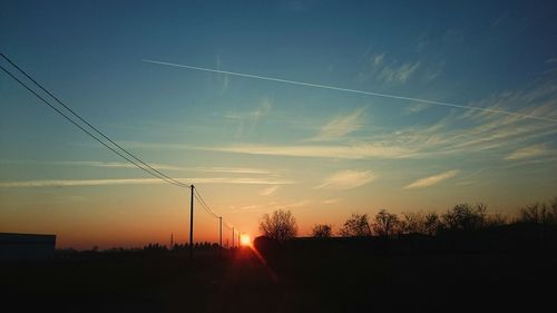 Electricity pylon at sunset