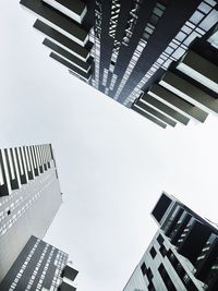 Low angle view of office building against sky