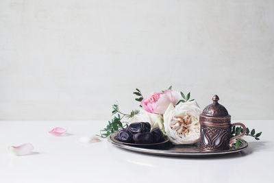 Pink roses on table