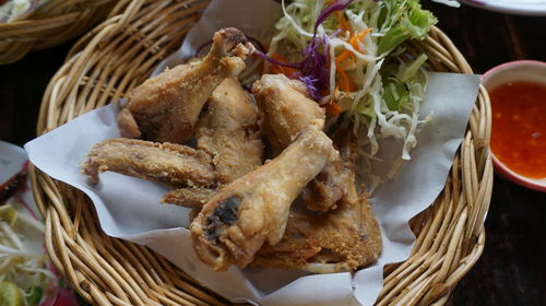 High angle view of burger in basket on table