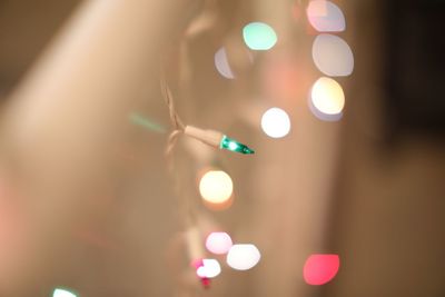 Close-up of hand holding cigarette