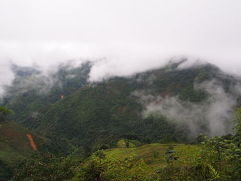 Scenic view of land against sky