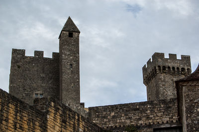 Low angle view of beynac castle against sky