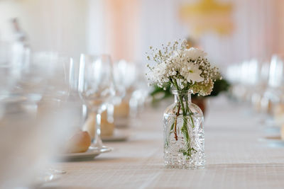 Flower vase on table