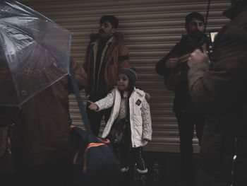 People standing in corridor