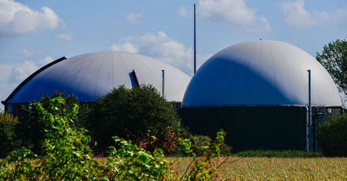 Tent on field against sky