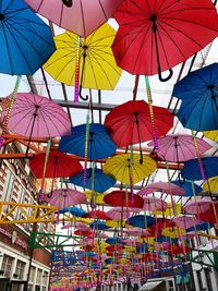 Low angle view of umbrellas hanging on ceiling