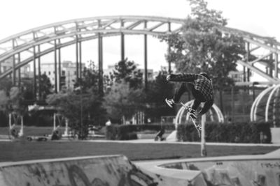 Man jumping in skatepark