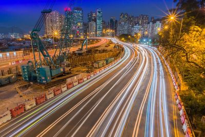 High angle view of light trails on road at night