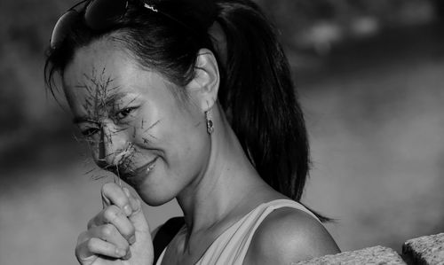 Close-up of young woman looking away