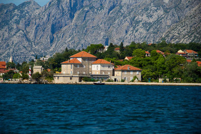 View of buildings by sea