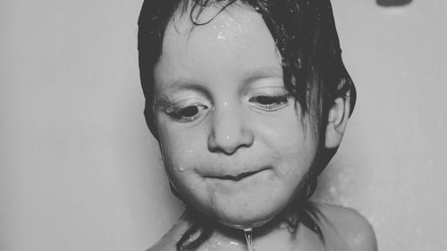 Close-up portrait of shirtless boy