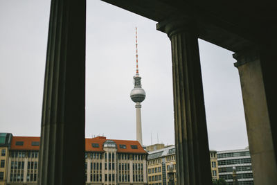 Buildings in city against sky