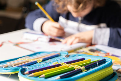 High angle view of multi colored pencils on table