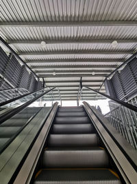 Low angle view of escalator in building