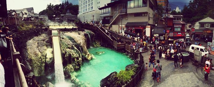 Panoramic view of people in city