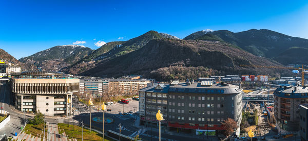 Cityscape of andorra la vella, capita city of andorra wit a view on pyrenees mountains