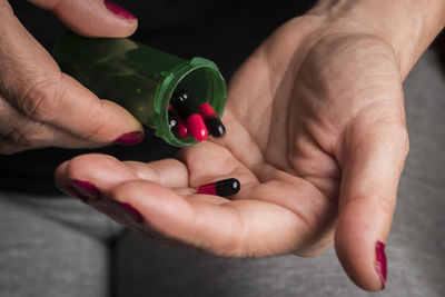 Close-up of woman holding hands