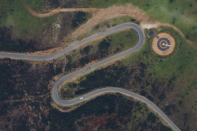 High angle view of car on road along trees