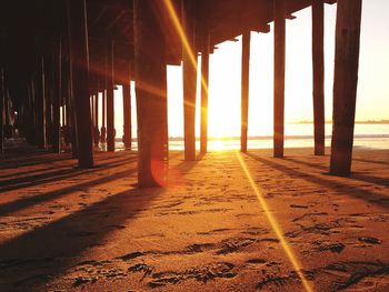 Scenic view of beach against sky during sunset