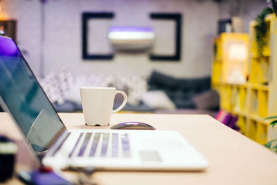 Coffee cup on table