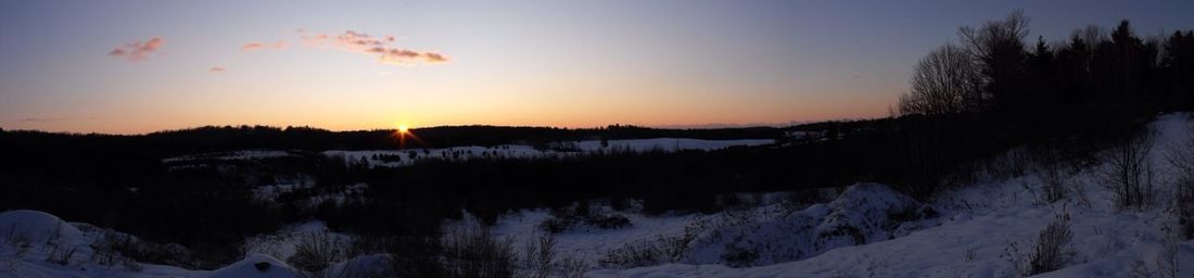 Scenic view of snow covered mountains