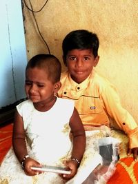 Portrait of happy siblings