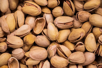 Background of fried pistachios. nuts for a vegetarian diet.