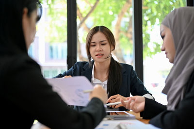 Business colleagues working at office